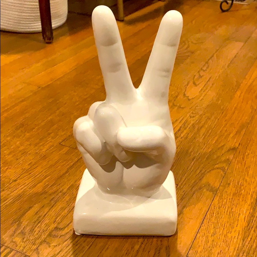 Peace sign ceramic statue